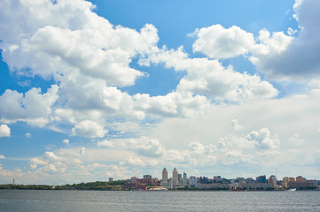 Naklejka premium view of the Dnipro city in the clouds