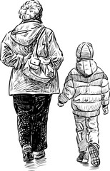 Grandmother and grandson go for a walk