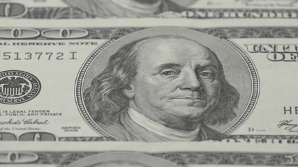 One hundred dollar bills close-up. Macro photography of banknotes. Portrait of Benjamin Franklin - 7