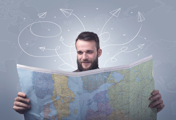 Young man holding map