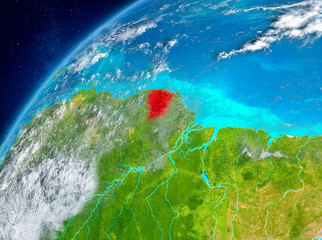 Space view of French Guiana in red