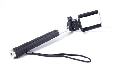 Selfie stick in a white background