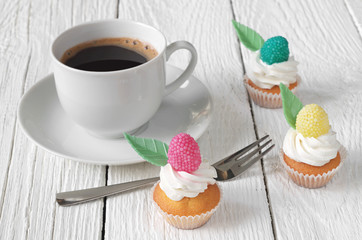 Colorful cakes and coffee