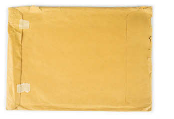 Old vintage orange crumpled envelope on white