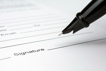 put a signature on an contract waiting to be signed