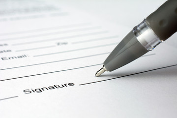 put a signature on an contract waiting to be signed