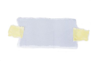 Obraz premium Pieces of torn note paper sheets with adhesive sticky tape stuck