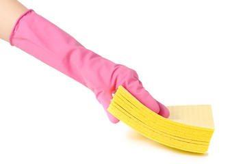 Hand in a rubber glove for cleaning yellow rag for cleaning isolated