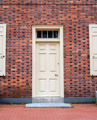 Historic colonial door on a brick building in Pennsylvania