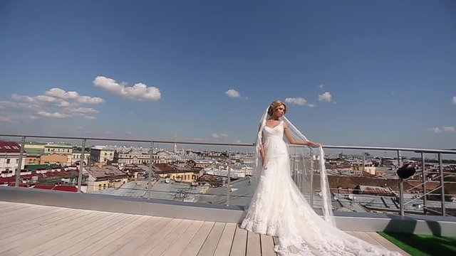 Bride and groom at the roof in the city