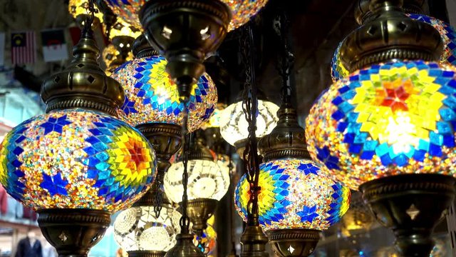 4K view of colorful mosaic glass lamps in the Turkish market.   
