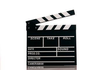 Fototapeta premium Clapper board isolated on white background with copy space. Movie production clapper board, close-up. Wooden black clapper board front view.