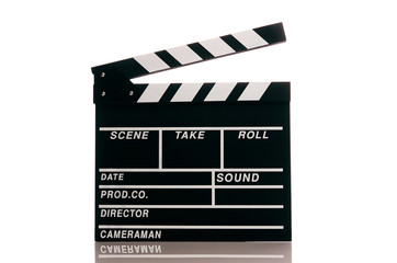 Fototapeta na wymiar Clapper board isolated on white background with copy space. Movie production clapper board, close-up. Wooden black clapper board front view.