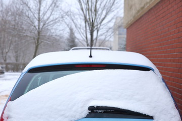 Cars that stand in the open air in the winter are usually exposed to frosty weather conditions and in addition, during snowfall are all white.