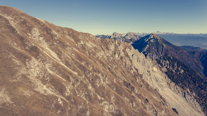 Fototapeta na wymiar Aerial view of spectacular mountain ridge in autumn colors.