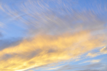Beautiful natural background. Fantastic red sunset and dark ominous clouds.