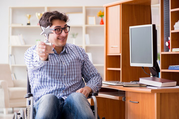 Disabled student studying at home on wheelchair