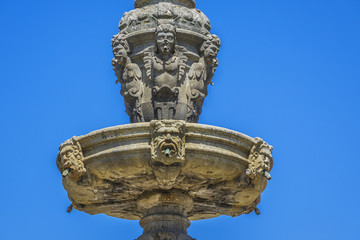 Obraz premium Fountain of Campo das Hortas (Chafariz do Campo das Hortas, 1594) - fountain located in the centre of garden space fronting the Arco da Porta Nova in Braga. Portugal.