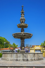 Fototapeta premium Fountain of Campo das Hortas (Chafariz do Campo das Hortas, 1594) - fountain located in the centre of garden space fronting the Arco da Porta Nova in Braga. Portugal.