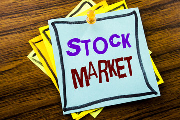 Writing text showing Stock Market. Business concept for Equity Share Exchange written on sticky note paper on the wooden background.