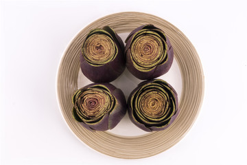 Some artichokes on a plate