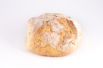 a loaf of bread on a white surface