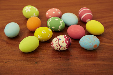 Fototapeta na wymiar happy easter eggs on wooden