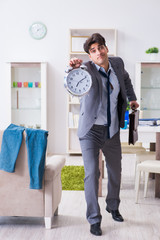 Businessman late for office due to oversleeping after overnight working