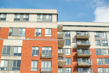 Obraz premium Modern condo buildings with huge windows and balconies in Montreal, Canada
