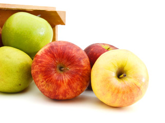 juicy apples in wooden crate, isolated on white