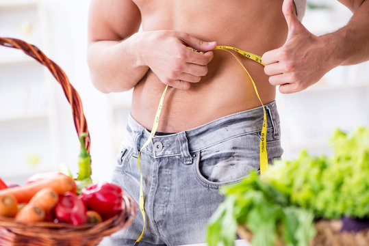 Young man in healthy eating and dieting concept