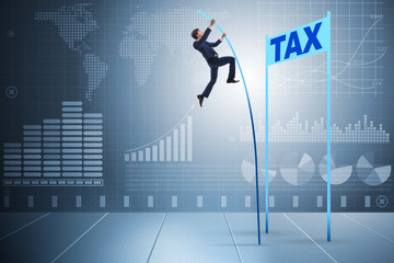Businessman jumping over tax in tax evasion avoidance concept