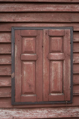 Asian Wooden window on wood wall background in country. wooden door of traditional house in ancient village of Thailand