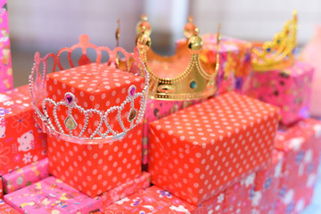 Crown on present gift boxes. Many gifts box with decoration in Valentine or new year party event. Box for Lucky draw in seasonal and holiday party.