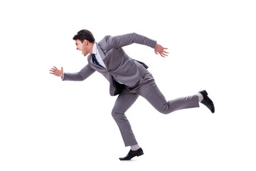 Young businessman running forward isolated on white