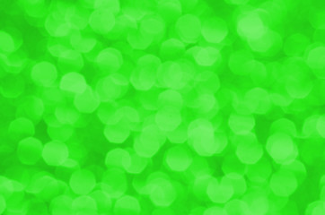 Obraz premium Bright pastel textured springtime green background. Celebrate spring Holiday including Easter and St. Patrick Day with this abstract backdrop. 
