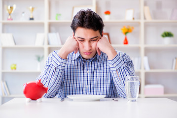 Man running out of money in restaurant and using savings from pi