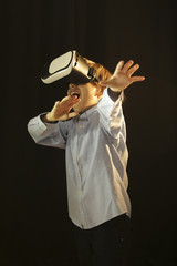 Boy enjoying his 3D virtual reality glasses at school