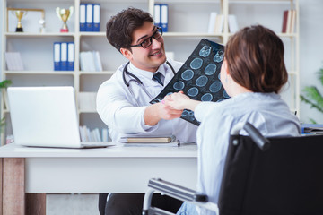 Doctor explaining to patient results of x-ray imaging