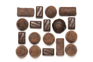 Assorted chocolate candies on white