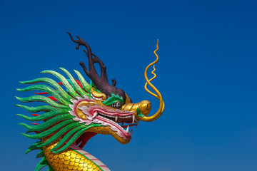 Dragon statue on the blue sky