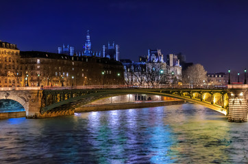 Fototapeta na wymiar Twilight view onto the Seine at Pont Notre Dame Bridge in Paris France