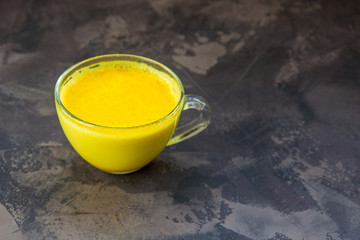 Golden turmeric milk. Healthy and aromatic detox beverage