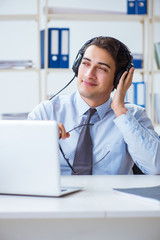 Sales assistant listening to music during lunch break