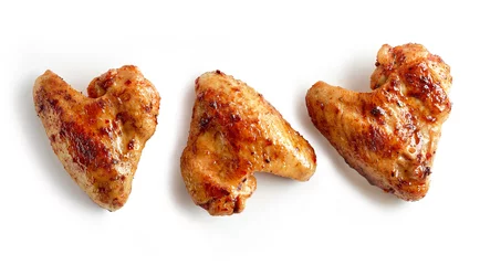 Foto op Plexiglas roasted chicken wings © Mara Zemgaliete