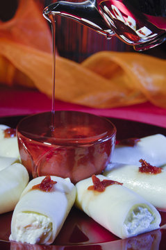Pouring Syrup on Halawa Jubon, Arabic Sweets for Ramadan and Eid
