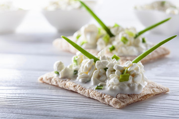 Cottage cheese with green onions.