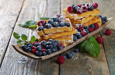 Waffles with raspberry and blueberry