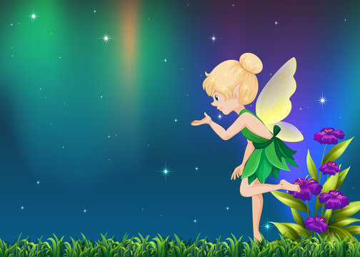 Cute fairy flying in garden at night