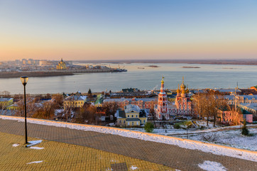 Fototapeta premium Beautiful panoramic view of the evening city near Kremlin with the Stroganov Church and Oka river, Nizhny Novgorod, Russia 